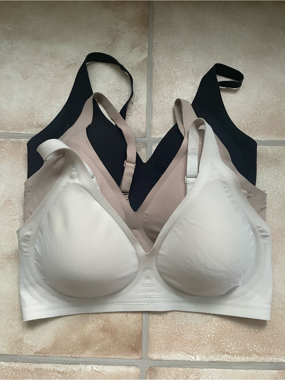3 pack of lightly padded, adjustable strap, plunge neck smoothing bras; M
